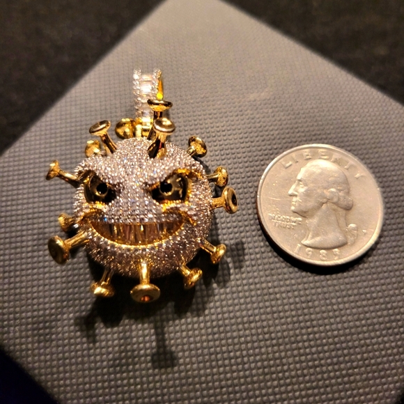 Other - 14k gold fill over brass "virus" pendant.